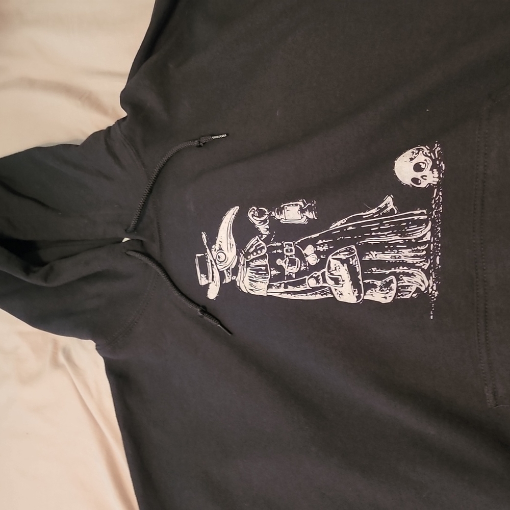Black hooded sweatshirt with good artwork on front, size is XL